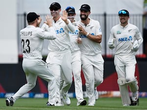 New Zealand celebrate the wicket of Joe Root