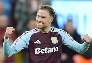 Aston Villa's Matty Cash celebrates scoring their side's third goal against Brentford.