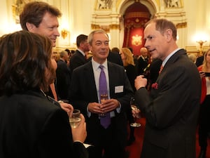 Reform UK leader Nigel Farage and deputy leader Richard Tice speaking to the Duke of Edinburgh (Aaron Chown/PA)