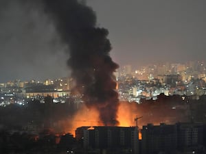 Smoke rises above a building