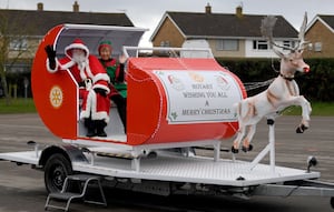 SThe Rotary Club of Shrewsbury brought Santa along to The Grange Primary School, Shrewsbury to hand out books to the children