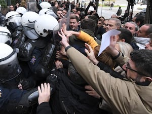 Protesters and police clash