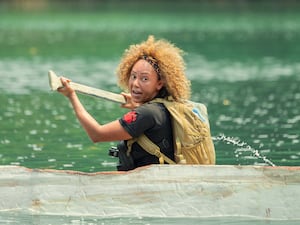 Spice Girl Mel B in a boat in a still from Celebrity Bear Hunt