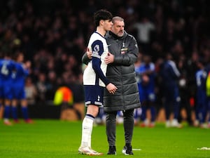 Ange Postecoglou and Archie Gray embrace