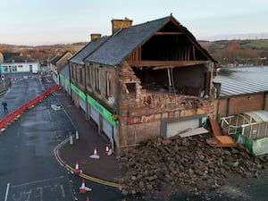 Shop with wall that collapsed in high winds