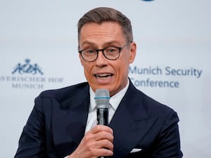 Alexander Stubb speaking into a microphone at the Munich Security Conference