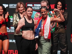 Katie Taylor (left) and Amanda Serranon pose during a weigh-in ahead of their undisputed super lightweight title bout