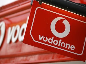 Vodafone said it remains confident its merger with Three UK will get a green light from regulators (Chris Ison/PA)