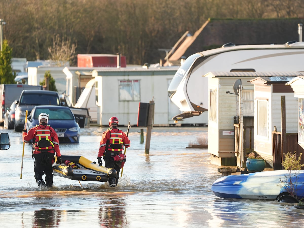 Danger to life flood warning issued as dozens of people rescued by ...