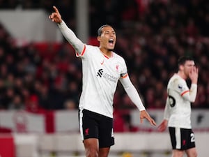 Liverpool’s Virgil van Dijk points and shouts