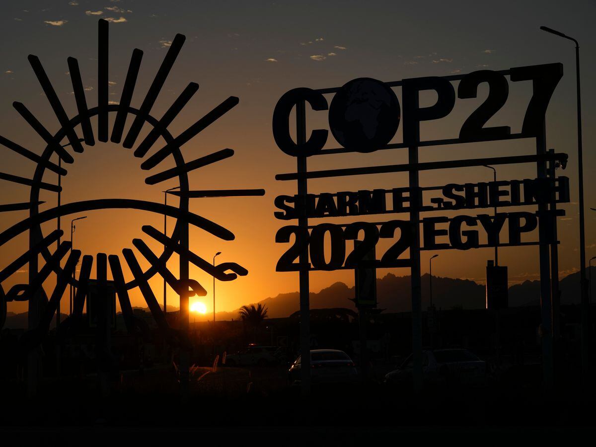 The sun sets outside the venue of the Cop27 UN Climate Summit, in Sharm El-Sheikh, Egypt