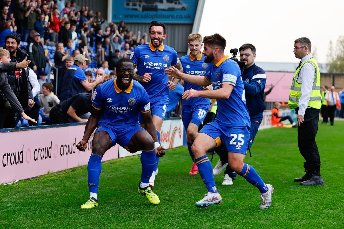Dan Udoh of Shrewsbury Town celebrates after scoring a goal to make it 1-0 (AMA)